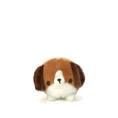 a brown and white stuffed dog on a white background