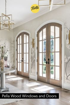 a living room with wood windows and doors