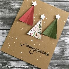 an origami christmas card with two trees on it