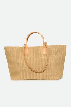 Experience the luxury of Italian craftsmanship with the exquisite Lisbon tote. Meticulously hand-sewn from straw and premium Italian leather. Yellow weave and natural tan leather contrast, this tote exudes timeless refinement and summer festivities. Size At base 15" length X 7" width 13" height 23" at tote opening 13.5" Large strap clearance 5" Short handle clearance 8" X 10" Inner zip pocket Details and Care Color: Yellow with light natural tan leather contrast Made by hand in Asolo, Italy Spot Luxury Bag With Rolled Handles In Natural Color, Luxury Straw Tote Bag With Rolled Handles, Luxury Beige Tote Beach Bag, Luxury Vacation Shoulder Bag With Rolled Handles, Luxury Natural Shoulder Bag With Rolled Handles, Natural Leather Beach Bag For Shopping, Luxury Everyday Straw Tote Bag, Luxury Woven Beach Bag In Natural Color, Luxury Beige Straw Bag For Summer