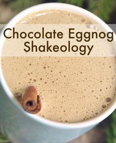 a close up of a cup of coffee with the words chocolate eggnog shakeology