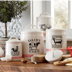 dairy products are displayed on a wooden table