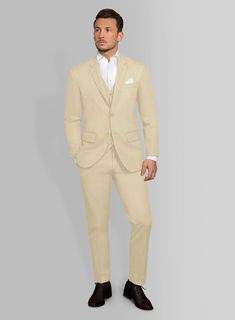 A sophisticated suit even when the heat is trying its very best to have the opposite effect. Crafted from cotton lycra, the beige hue of the Italian Sand Beige Cotton Stretch Suit can do wonders while the lightness of the material will make it an ideal choice when the temperature rises.   Look Includes  Italian Sand Beige Cotton Stretch Fabric  Two Button Jacket Style  Notch Lapel  Corozo Beige Buttons  Single Vent  Three Cuff Buttons  Two Welted Back Pockets on Trousers   You can change the loo Tailored Beige Formal Sets, Tailored Beige Sets For Formal Occasions, Tailored Beige Sets For Business Casual, Fitted Beige Cotton Suits, Tailored Beige Cotton Suit, Classic Beige Cotton Suit, Tailored Beige Semi-formal Set, Tailored Beige Set For Semi-formal Occasions, Tailored Beige Sets For Semi-formal Occasions