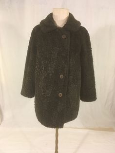 "vintage 1970s women's fake fur coat chocolate brown Susan Lynn, Quality by Item House Inc. brown acetate lining brown buttons up front w/smaller clear neck button side pockets good vintage condition, light wear no label size, see below measures, lying flat, shoulder-n/a-raglan seams, where jacket starts to slope down-about 17\"  chest-20 1/2\" sleeve from underarm-13\" length-33\"     We do not offer returns or refunds unless something is grossly misrepresented. Please contact us within 2 busin Brown Fur Coat With Buttons For Fall, Brown Fur Coat With Button Closure For Fall, Brown Winter Fur Coat With Button Closure, 1970s Womens Fashion, Dark Brown Coat, 1970s Fashion Women, Persian Lamb, 1970s Women, Fake Fur