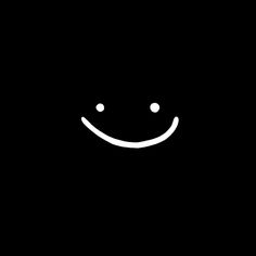 a black background with a white smiley face