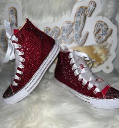 Custom Bling Converse All Star Chuck Taylor Sneakers. All designs handmade and embellished with a variety of high quality crystals. Great for weddings, proms, homecomings, birthdays, special events or just your everyday girly girl.  **IF YOU NEED THIS ITEM BEFORE THE PROJECTED SHIPPING TIME YOU MUST CONTACT US BEFORE ORDERING   (additional charges may apply) ** Shoe Size: WOMEN'S size 5 to size 12;  Size availability may vary based on our suppliers current inventory. If your size is out of stock Red Bedazzled Converse, Luxury Red Custom Sneakers For Women, Hoco Converse, Wedding Assesories, Prom Shoes Wedges, Bedazzled Converse, Red High Top Converse, Quinceanera Shoes, Biker Wedding