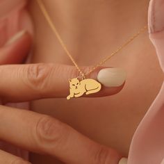 🐈 Step into the realm of timeless elegance with our "Cat Necklace" collection - where sophistication meets feline grace in a symphony of craftsmanship and charm. 💫 Each pendant in our collection is a manifestation of artistry, meticulously handcrafted to perfection. Crafted in two stunning variants - 925 sterling silver rose gold and gold plated - these pendants exude an aura of understated luxury, elevating every ensemble with effortless style. ❣️ Embrace individuality with customizable chain Elegant Cat Design Necklace For Anniversary, Pet Jewelry, Gifts For Veterinarians, Animal Necklace, Laser Cut Jewelry, Cat Pendant, Cat Charm, Cat Pendants, Custom Cat