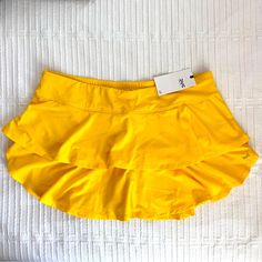 Uv Protection Xl Spring Sports Skort, Sporty Skirted Swim Skirt, Spring Sports Short Skirt, Sporty Skirt For Spring Sports, Stretch Swim Skirt For Sports, Short Sports Skirt For Spring, Casual Sports Skirt, Casual Skirted Swim Skirt For Sports, Sporty Solid Skirt For Sports