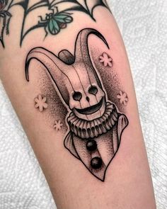 a black and white photo of a rabbit tattoo