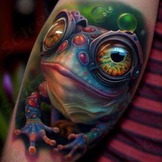 a colorful frog tattoo on the arm with bubbles and circles around it's eyes