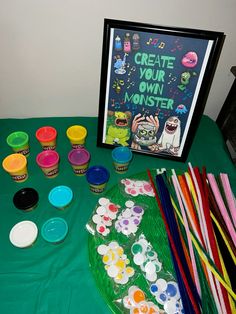 there are many items on the table to be used for arts and crafts, such as cupcakes