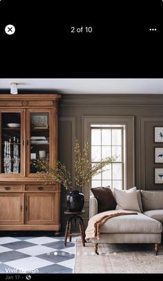 the living room is decorated in brown and white