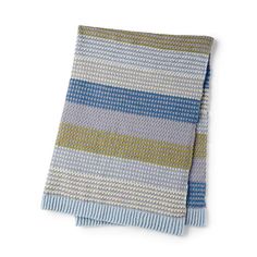 a blue and yellow striped towel on a white background