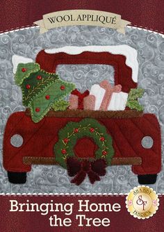 a red truck with presents in the back and christmas decorations on it's hood