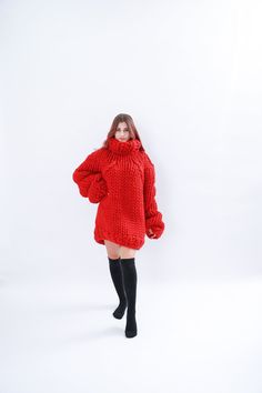 "Perfect for home or evening events, this super giant chunky turtleneck wool sweater is a classic piece to go with anything in your closet. The chunky knit and slightly oversize loose fit has 5 layers of high quality wool that's made for comfort and good visual look. Red Chunky knit sweater with cable DETAILS - The sweater has chunky merino of wool - Made from 100% high quality wool - The sweater is knitted with 125 oz (3.6 kg ) of high quality premium merino wool - The model is 170 cm tall (reg Cozy Red Winter Sweater, Red Chunky Knit Turtleneck Sweater, Cozy Red Long Sleeve Sweater, Red Chunky Knit Long Sleeve Sweater, Red Fitted High Neck Sweater, Fitted Red High Neck Sweater, Red Oversized Knitted Sweater, Oversized Red Knitted Sweater, Red Hand Knitted Winter Sweater