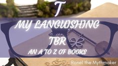 a pair of glasses sitting on top of a book with the title, my laughing tbr an at to z of books