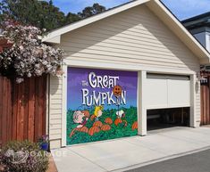 a garage with a sign for the great pumpkin on it