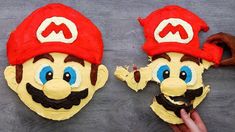 there are two cakes made to look like mario bros