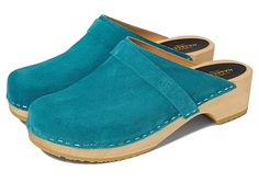 Swedish Hasbeens Swedish Husband - Women's Clog Shoes : Peacock : Slip in to chic style with a 70s twist with the Swedish Hasbeens Swedish Husband mid-heel clog mules! The handcrafted clog mule is constructed from durable, chrome-free natural-grain leather upper that softens and slightly stretches with wear for versatile and timeless wear. Dyed, real fur from cow originated from Italy. Slip-on silhouette for easy on and off. Round, closed-toe front. Leather lining and heel insole. Durable lime-t Clog Mules, Swedish Hasbeens, Clog Shoes, Clog Heels, Clogs Shoes, Womens Clogs, Real Fur, Mid Heel, Product Reviews