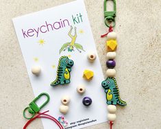 the keychain kit is decorated with plastic beads