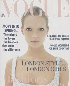 a magazine cover with a woman wearing a white dress