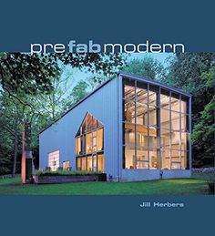 the cover of prefab modern, featuring a house with glass windows and trees in the background