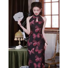 Vintage Butterfly Black Cheongsam Transform into an elegant butterfly with our Vintage Butterfly Black Cheongsam. This stunning dress combines traditional cheongsam design with a vintage twist, perfect for those who appreciate sophistication and timeless style. Exquisitely crafted and flattering on all body types, this dress will surely make you stand out in any occasion. Size Chart (cm) Bust Waist Hip Shoulder Width Dress Length S 82 66 86 36 120 M 86 70 90 37 120 L 90 74 94 38 120 XL 94 78 98 39 120 2XL 98 82 102 40 120 3XL 102 86 106 41 120 Elegant Black Cheongsam For Spring, Sleeveless Black Dress With Butterfly Print, Black Sleeveless Dress With Butterfly Print, Elegant Fitted Dresses With Butterfly Print, Sleeveless Cheongsam For Evening, Evening Fitted Black Cheongsam, Fitted Black Cheongsam For Evening, Summer Party Cheongsam With Stand Collar, Fitted Cheongsam For Evening