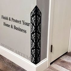 a sign on the side of a door that says finish & protect your home and business