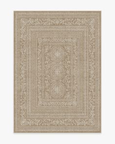 a beige area rug with an intricate design on the front and back side, in neutral tones