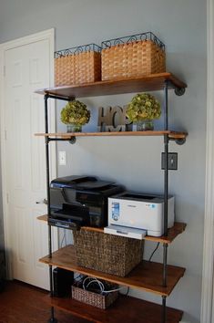 a shelf with two shelves and baskets on it