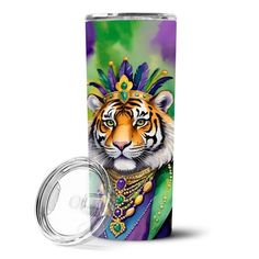 a purple and green tumbler with a tiger wearing a crown on it's head