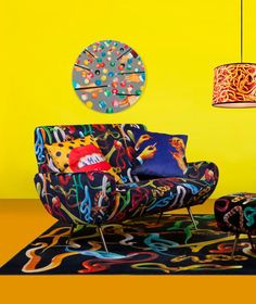 a living room with colorful furniture and lamps