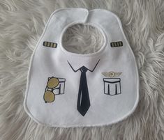 Super cute baby pilot bib! Made from 100% cotton fabric, terry cloth and heat transfer vinyl. Has KAM snap fastening Terry Cloth, Bibs, Childcare, Heat Transfer, Baby Bibs, Heat Transfer Vinyl, Cotton Fabric, Vinyl, Music Clothes