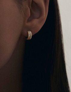 Inspired by Jennie's mother, Sun's vintage pleated ring, the Solis collection represents energy and strength. As an immigrant from South Korea in the 90's, Sun wore her ring as a reminder that she could make it through anything she set her mind to.Meet the first pair of Solis earrings. A combination of our signature ring and our best selling Pavé Hoop Huggie Earrings—they're a luxury piece that will shine day or night. Featuring ten round diamonds on each earring.Secure snap hinge closure. This Tarnish Resistant Huggie Rings, Timeless Tarnish Resistant Huggie Earrings, Classic Handmade Huggie Jewelry, Handmade Classic Huggie Jewelry, Vintage Yellow Gold Halo Jewelry, Rib Ring, Signature Ring, Pave Diamond Earrings, Signature Rings