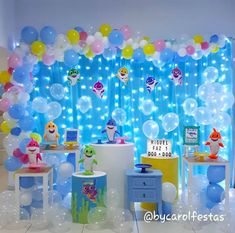 a room filled with balloons and decorations for a birthday or baby's first birthday