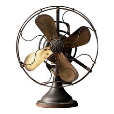 an old fashioned metal fan with wooden blades on it's bladed blades is shown against a white background