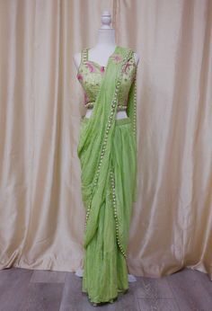 *Saree plus blouse set, prestitched and easy to wear  *Color: lime green, as pictured  *Indowestern Set  *Readymade: Bust 34, 36, 38 inches - please message us for size customization options! Green Lehenga With Dori Work, Traditional Summer Pre-draped Saree With Zari Work, Fitted Green Dola Silk Choli, Fitted Green Dola Silk Sets, Green Fitted Pre-draped Saree For Summer, Bollywood Style Green Dola Silk Sets, Green Bollywood Choli With Dori Work, Green Bollywood Dola Silk Sets, Bollywood Style Pre-draped Saree With Cutdana For Summer