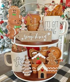 a basket filled with lots of different types of gingerbread cookies on top of a table