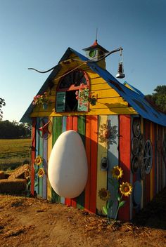 a colorful building with an egg on the outside