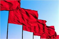 several red flags are flying in the wind