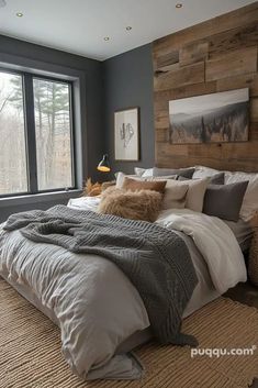 a bedroom with a large bed and wooden headboard in the corner, along with two windows