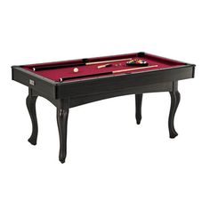 a black pool table with red cloth and cues on the top, in front of a white background