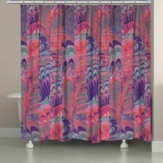 an abstract shower curtain with pink, purple and blue swirls on the outside of it