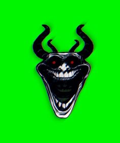 an evil looking mask with horns and fangs on a green background is seen in this image