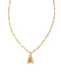 Personalize your everyday look with the Crystal Letter A Gold Short Pendant Necklace in White Crystal. Whether you’re rocking your initial or a loved one’s, this sentimental layer is one you’ll keep coming back to again and again. Metal 14k Gold Over Brass Material White CZ Closure Lobster clasp Size 16" chain w/ 3" extender, 0.62"L X 0.35"W pendantDue to the one-of-a-kind nature of the medium, exact colors and patterns may vary slightly from the image shown. | Kendra Scott Crystal Letter A Gold Steve Madden Mules, Short Pendant Necklace, Pearl Strands Necklace, Gold Shorts, Letter Pendant Necklace, Buy Crystals, Again And Again, Letter A, Letter Pendants