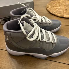 Air Jordan 11 Retro Medium Grey Men’s 9 Women’s 10.5 Never Worn Comes In Original Box Gray Lace-up Basketball Shoes With Air Cushioning, Gray Jordan Lace-up Shoes With Air Cushioning, Gray Jordan Shoes With Air Cushioning And Lace-up, Gray Lace-up Jordan Shoes With Air Cushioning, Jordan 11 Cool Grey, Jordan Grey, Air Jordan 11 Retro, Jordan 11 Retro, Air Jordan 11