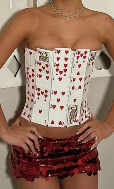 a woman wearing a corset with hearts on it