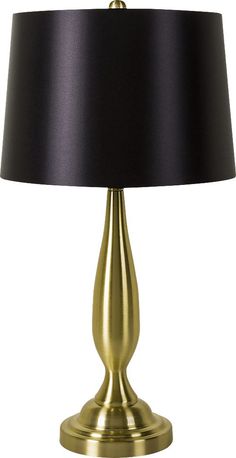 a gold lamp with a black shade on it