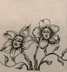 a drawing of two flowers on a piece of paper