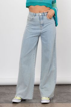 The Blue Jean Baby Jeans features a 90's inspired denim design with high waist, wide leg and made from an ultra soft denim. Worn With The France In Spring Cardigan. Color: Light Denim High Waist Wide Leg Raw Edge Hem Front & Back Pockets 100% Cotton Models are 5'4 - 5'9" and wearing size Small. These can be cute to desired length. Size Up For Looser Fit High-waisted Flare Jeans For Streetwear, Trendy Light Wash Wide-leg Jeans, Trendy Light Wash Wide Leg Flare Jeans, Trendy Full-length Denim Wide Leg Pants, Trendy Light Wash Cotton Wide Leg Pants, Trendy Light Wash Denim Wide Leg Pants, High Rise Denim Wide Leg Pants For Streetwear, Fall Light Wash Denim Wide Leg Pants, High-waisted Wide Leg Denim Pants With Five Pockets